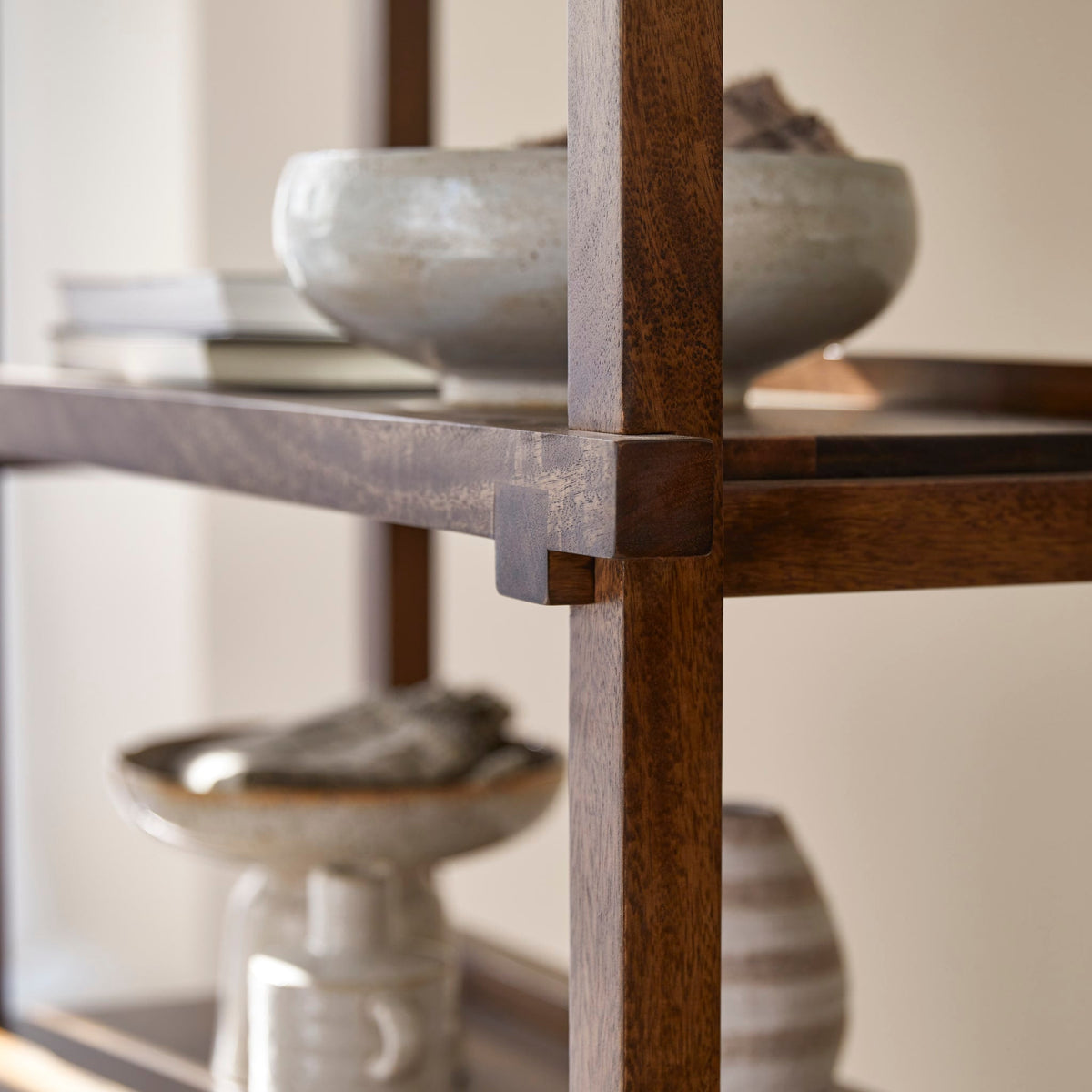 Tikamoon Arko dark mango bookcase, close-up of the base