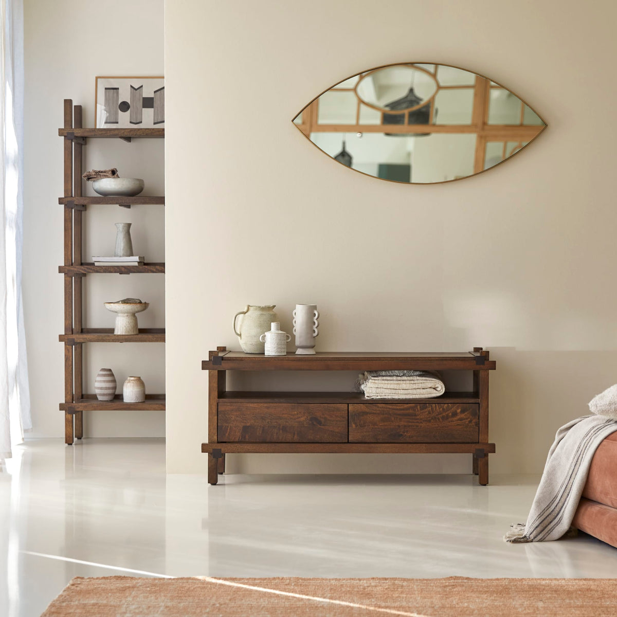 Tikamoon Arko two-drawer TV stand in solid mango, angled view