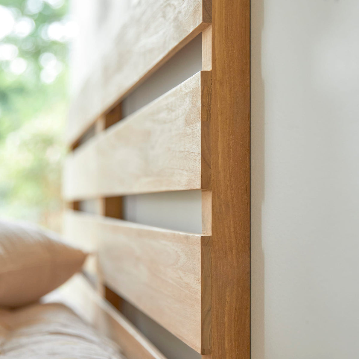 Tikamoon Urbain teak headboard, side view showing the shallow depth