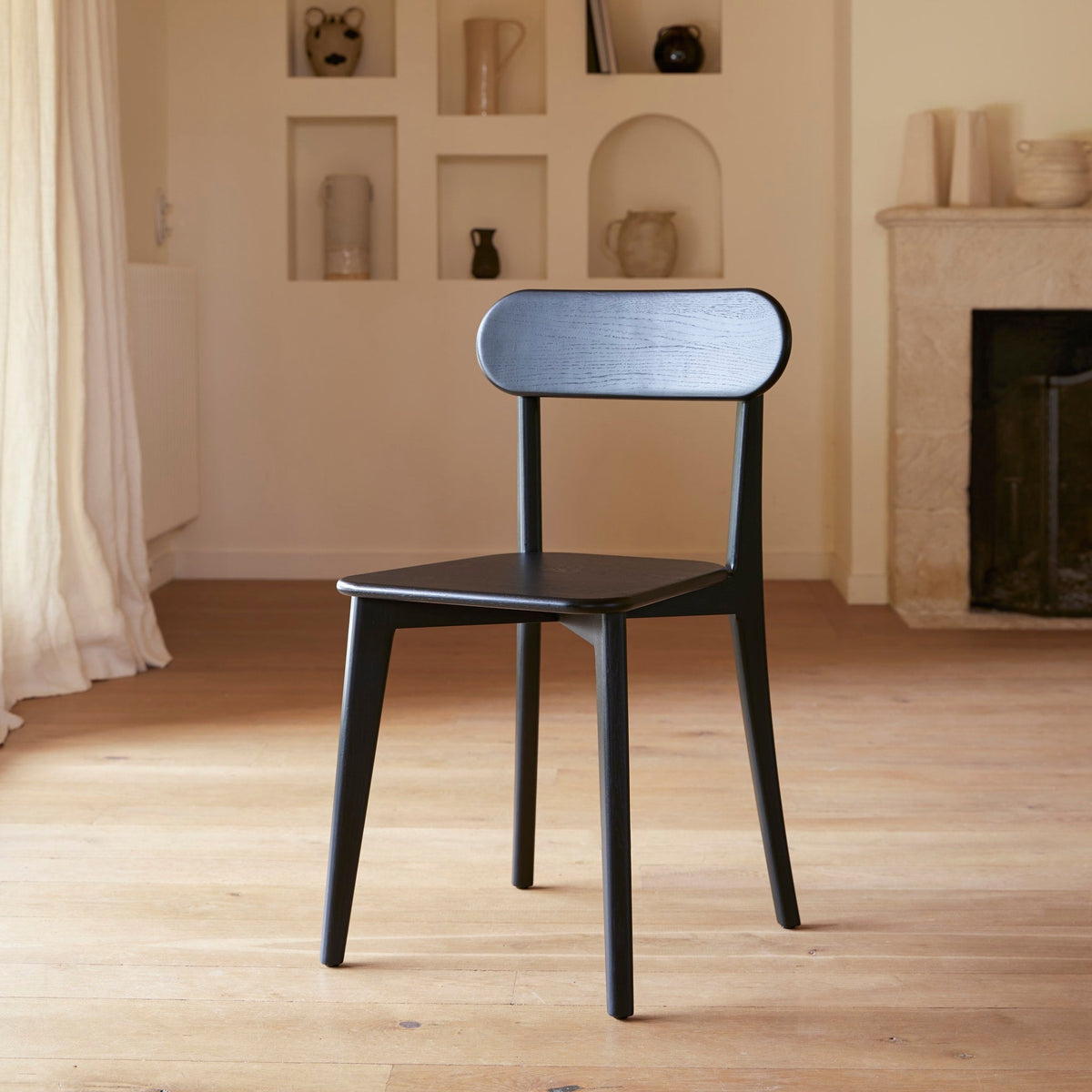 Tikamoon Abel black oak dining chair, front view