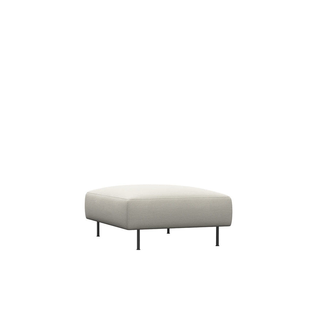 WOUD Collar Ottoman in white upholstered fabric on a wood frame designed by Yonoh studio, Danish design