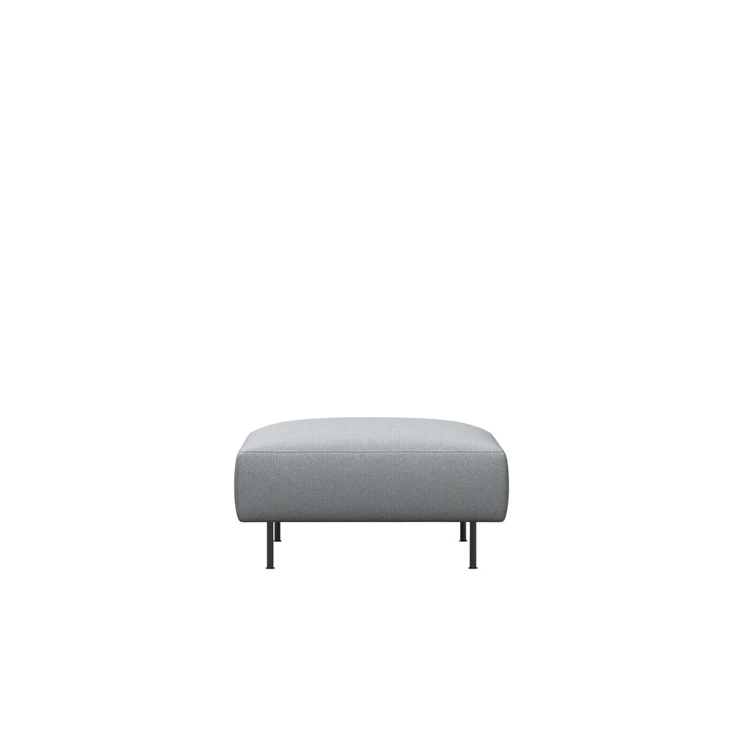 WOUD Collar Ottoman in grey upholstered fabric on a wood frame designed by Yonoh studio, Danish design