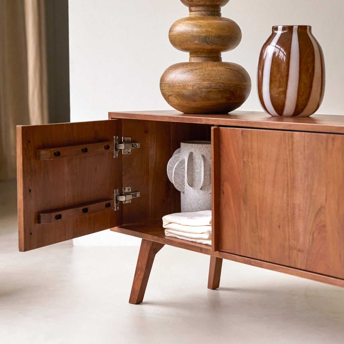 Tikamoon Niels TV stand in solid acacia wood, three-quarter view