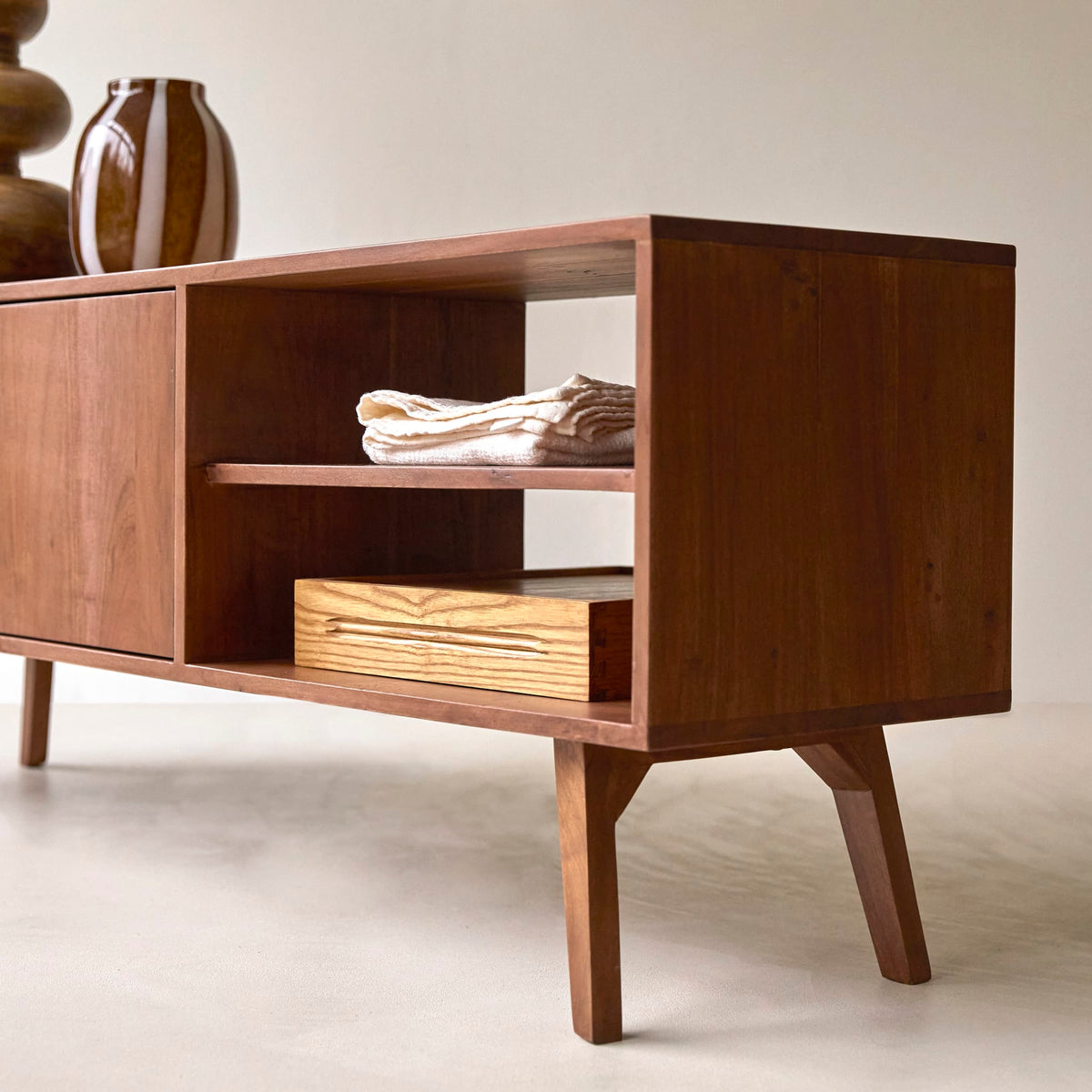 Tikamoon Niels TV stand in solid acacia wood, angled view