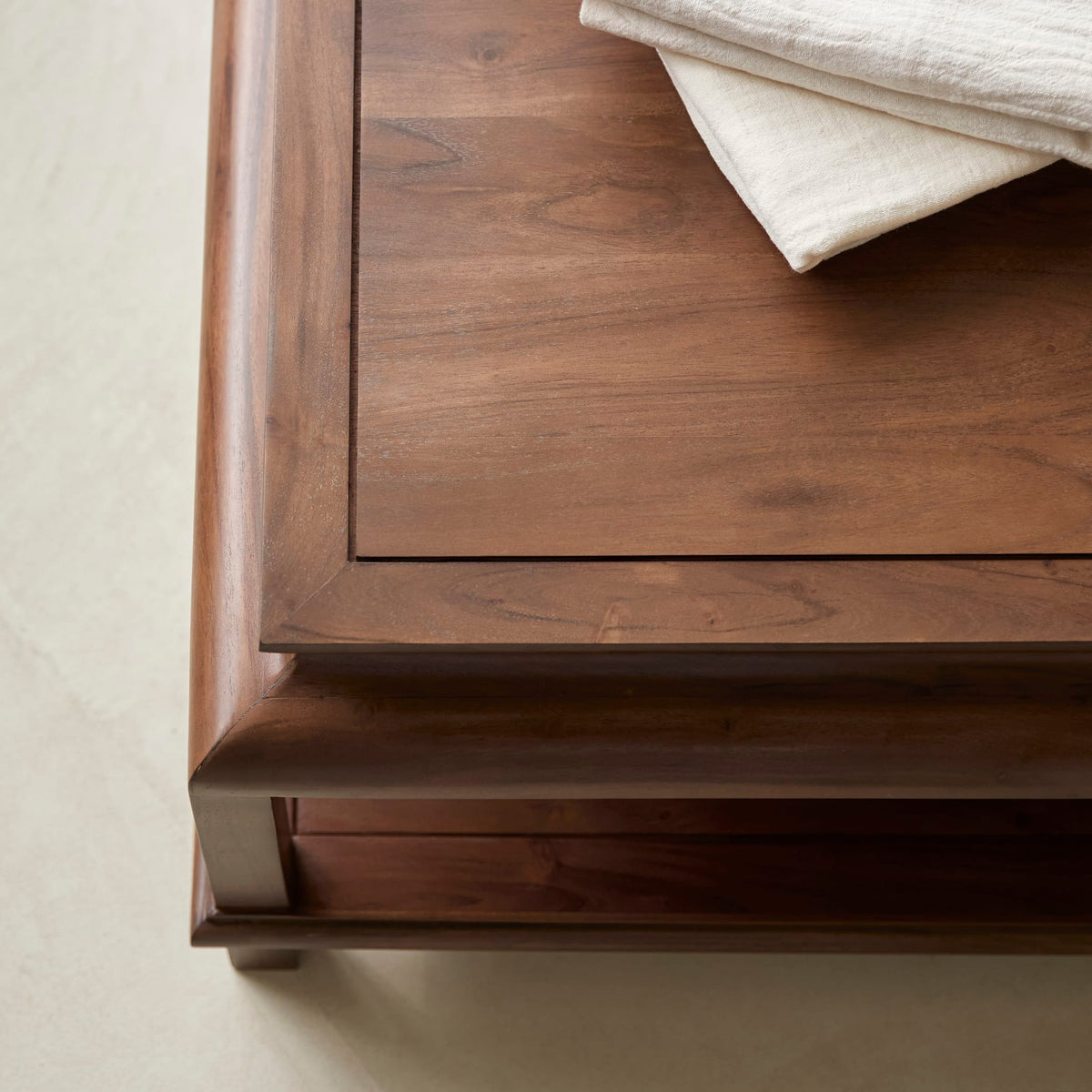 Achille acacia coffee table, side angle showing lower shelf