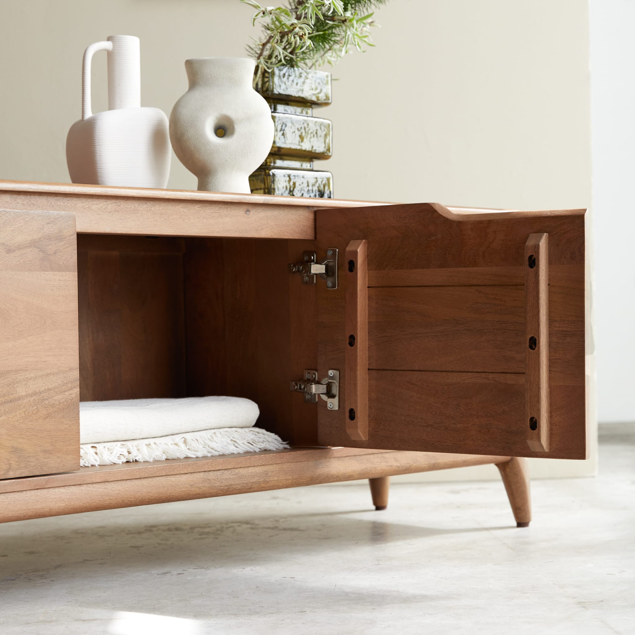 Tikamoon Gabrielle TV stand in solid mango wood, rear view