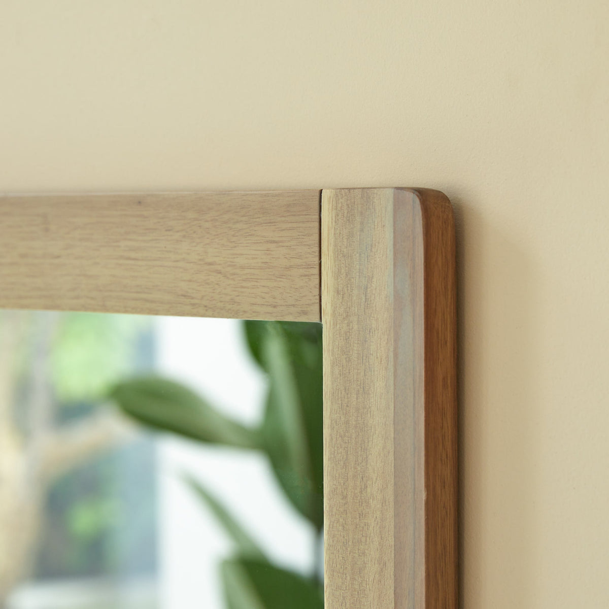 Tikamoon Lila mirror in solid acacia wood, angled view