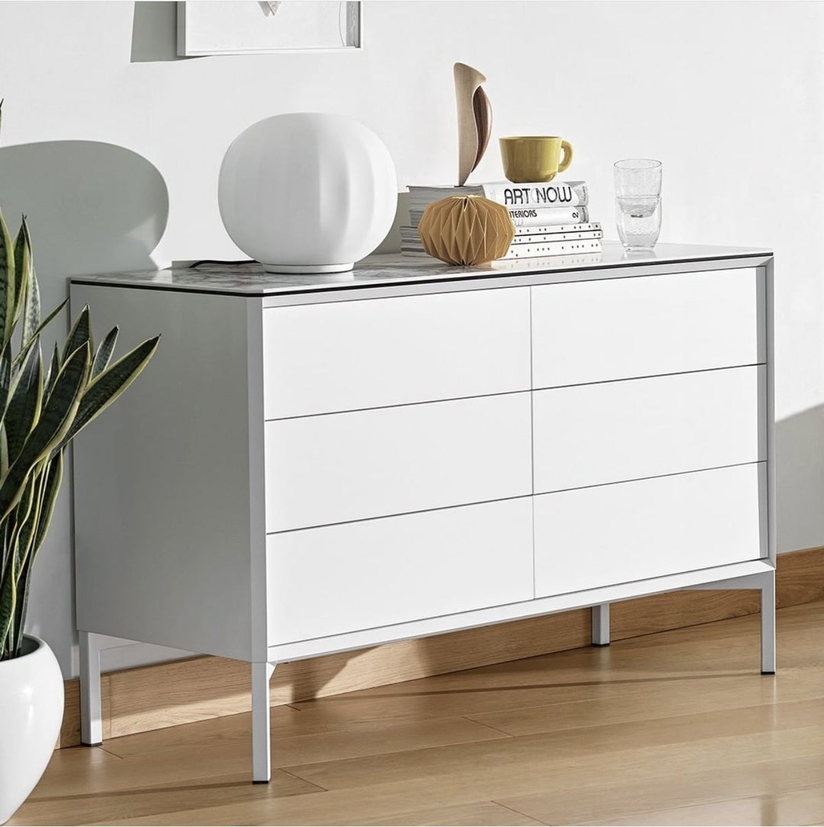 Luceplan Lita Stemless Table Lamp on a white dresser