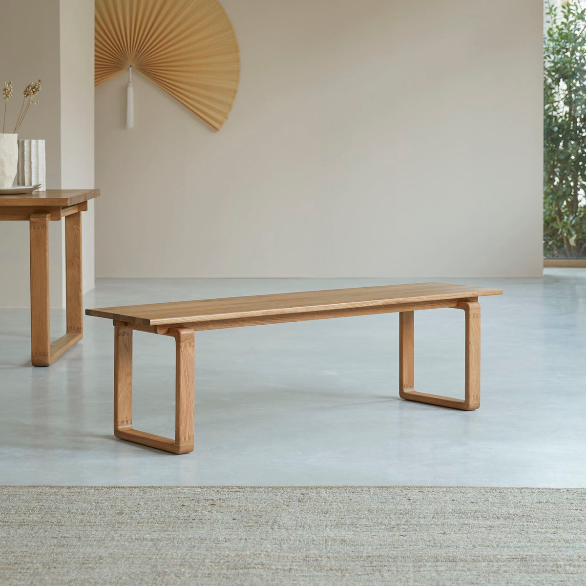 Tikamoon Sybille solid oak bench, front view of the full length