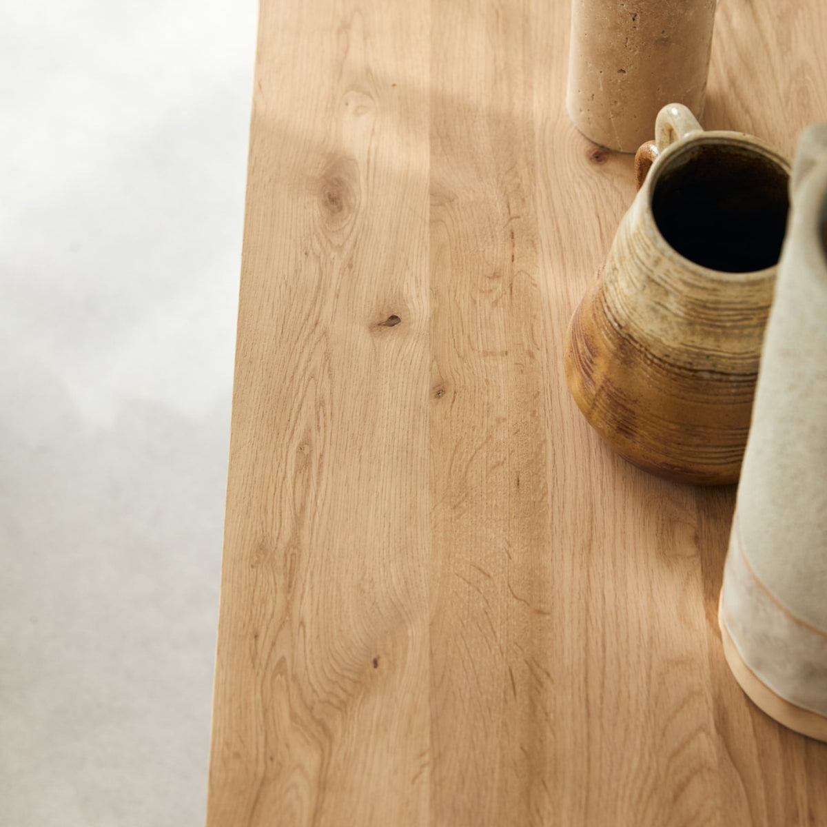 Tikamoon Anoa TV stand in solid oak, close-up of a caster