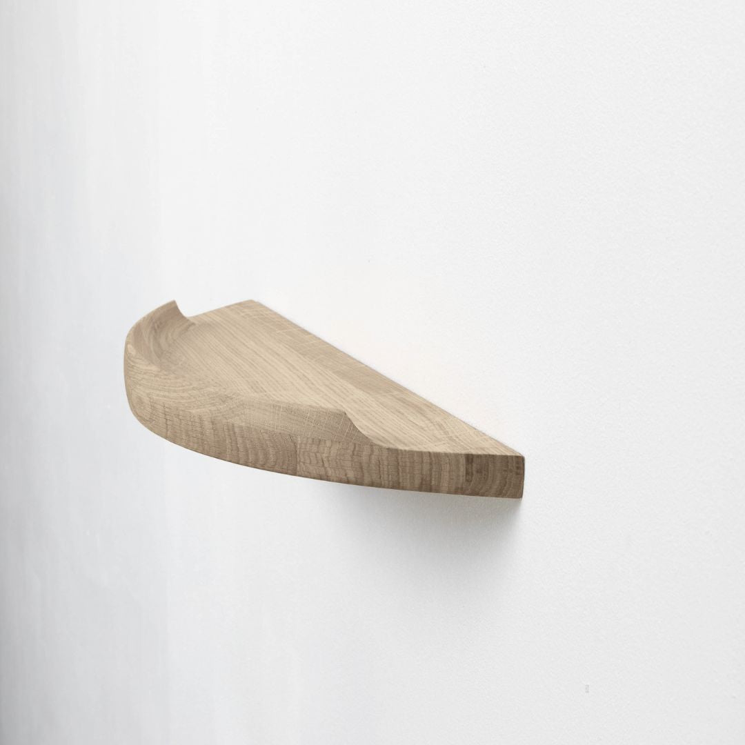 Aakjaer Arcus Shelf Small in white oiled oak, a 23.6 in floating solid oak wall shelf