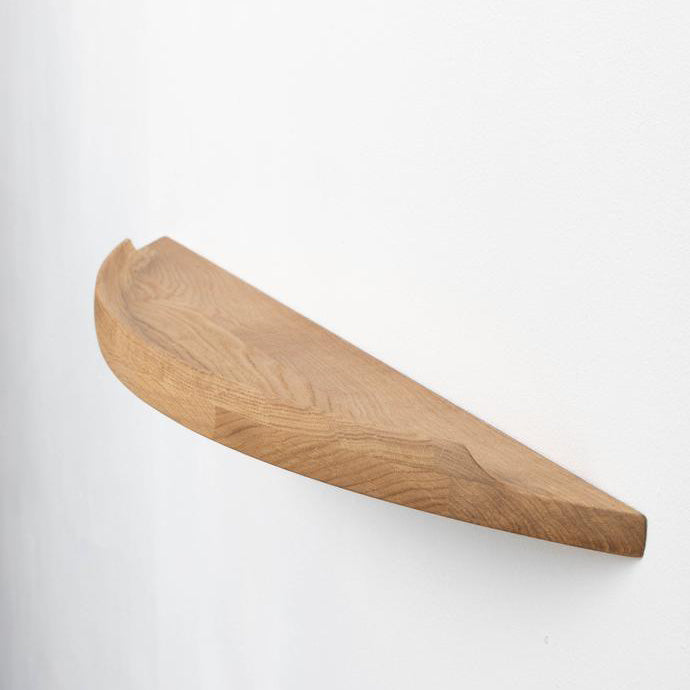 Aakjaer Arcus Shelf Large in natural oiled oak, a 43.3 in floating solid oak wall shelf