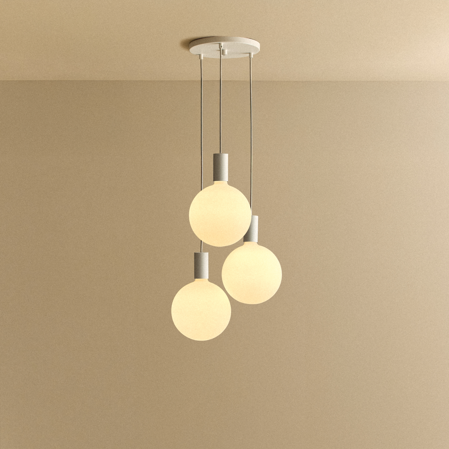 Alumina Triple Pendant with Sphere V bulbs by Tala, front view of the three-light fixture