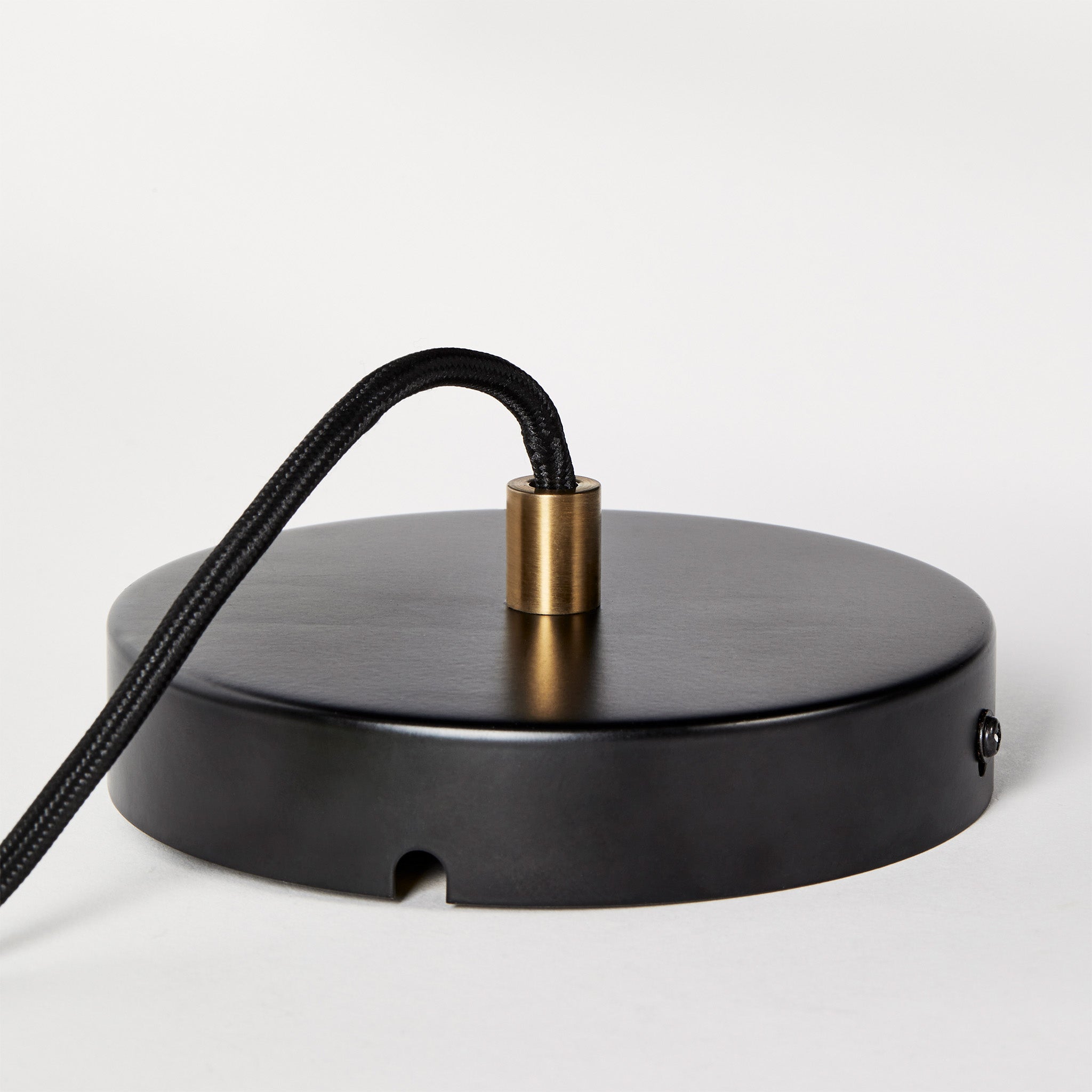 Basalt Single Pendant by Tala in Brass, angled view of the polished pendant ends