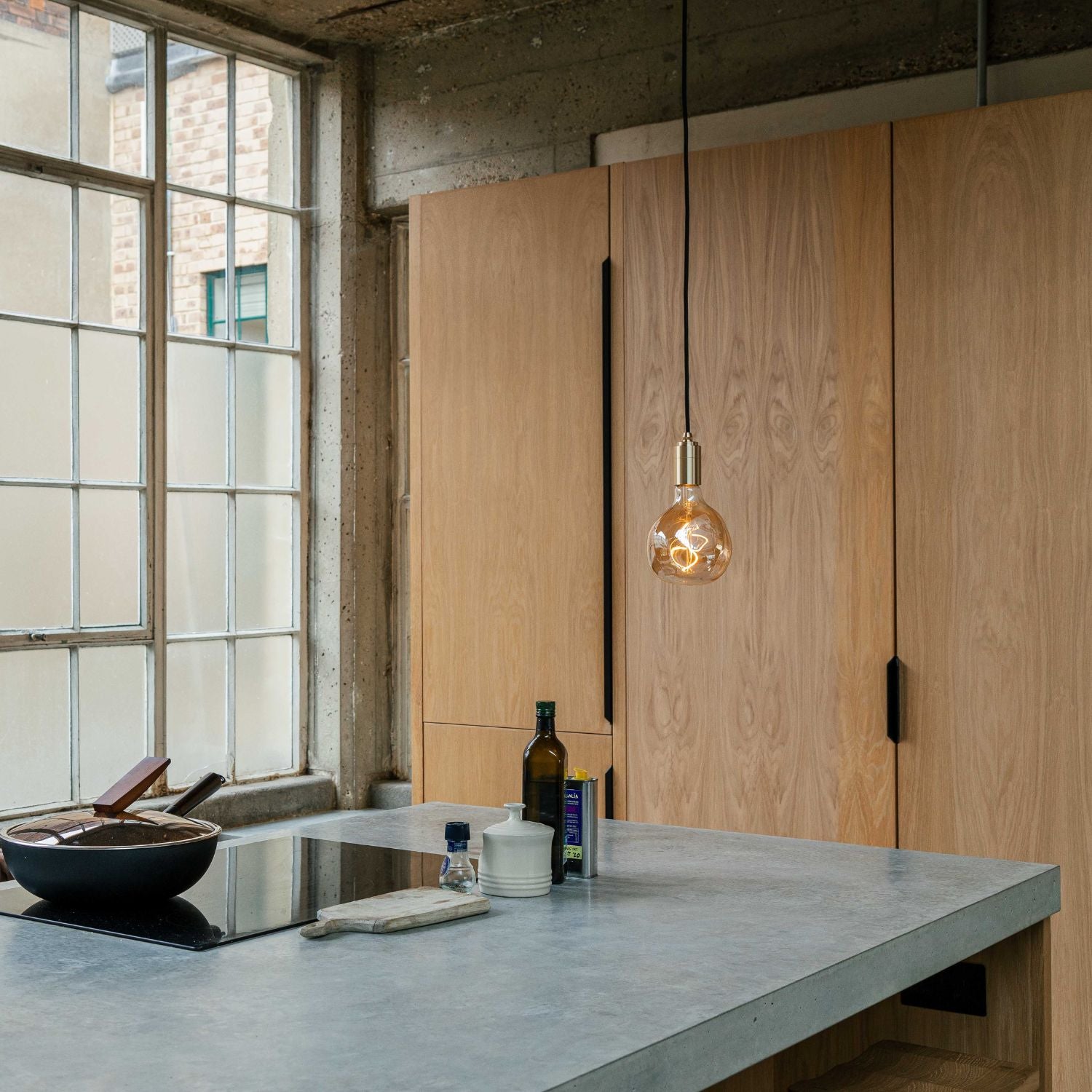 Brass Pendant with Voronoi I bulb, lifestyle setting