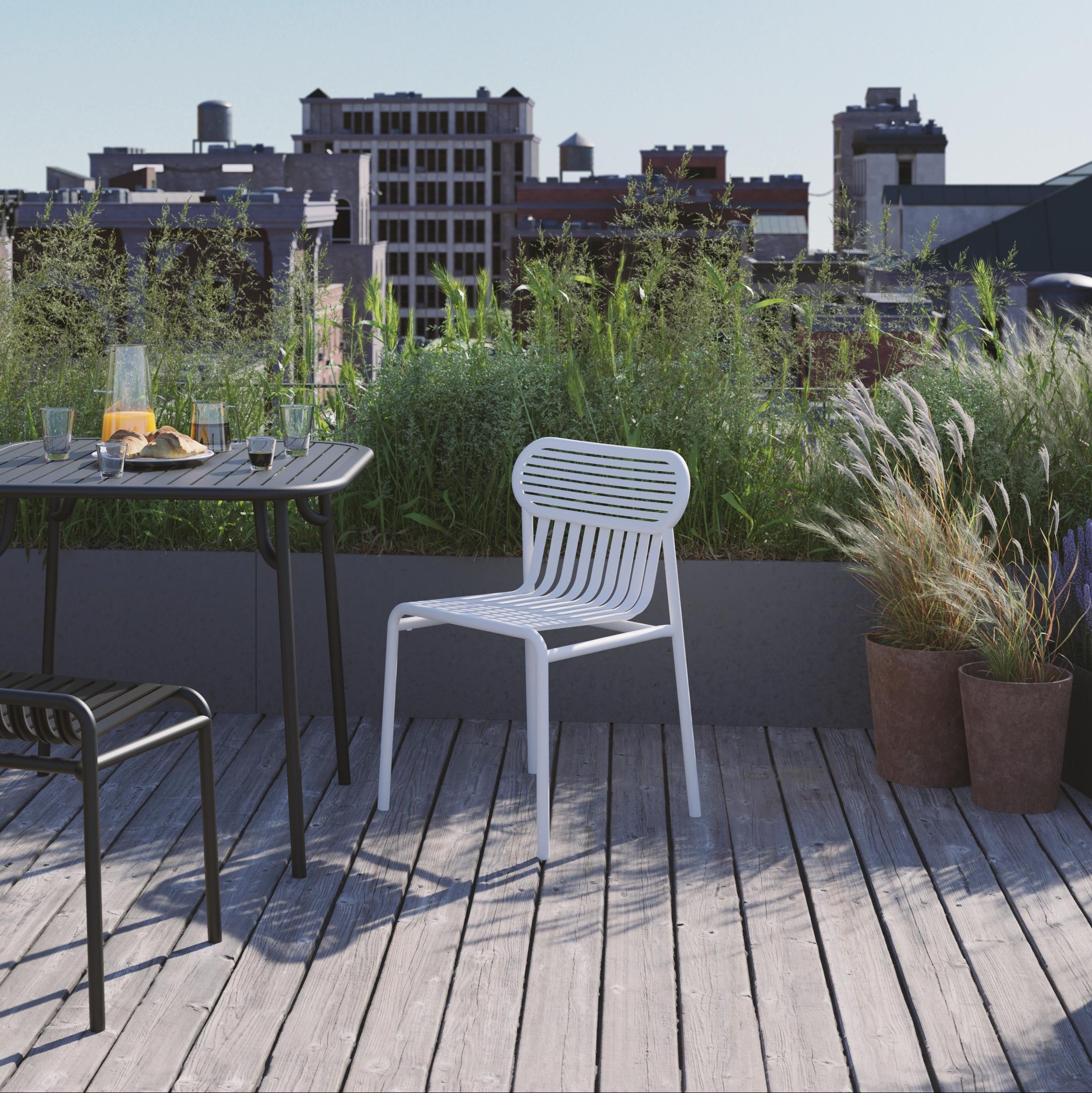 Petite Friture Week-End Bridge Armchair styled in a modern living room, designed by Pauline Deltour