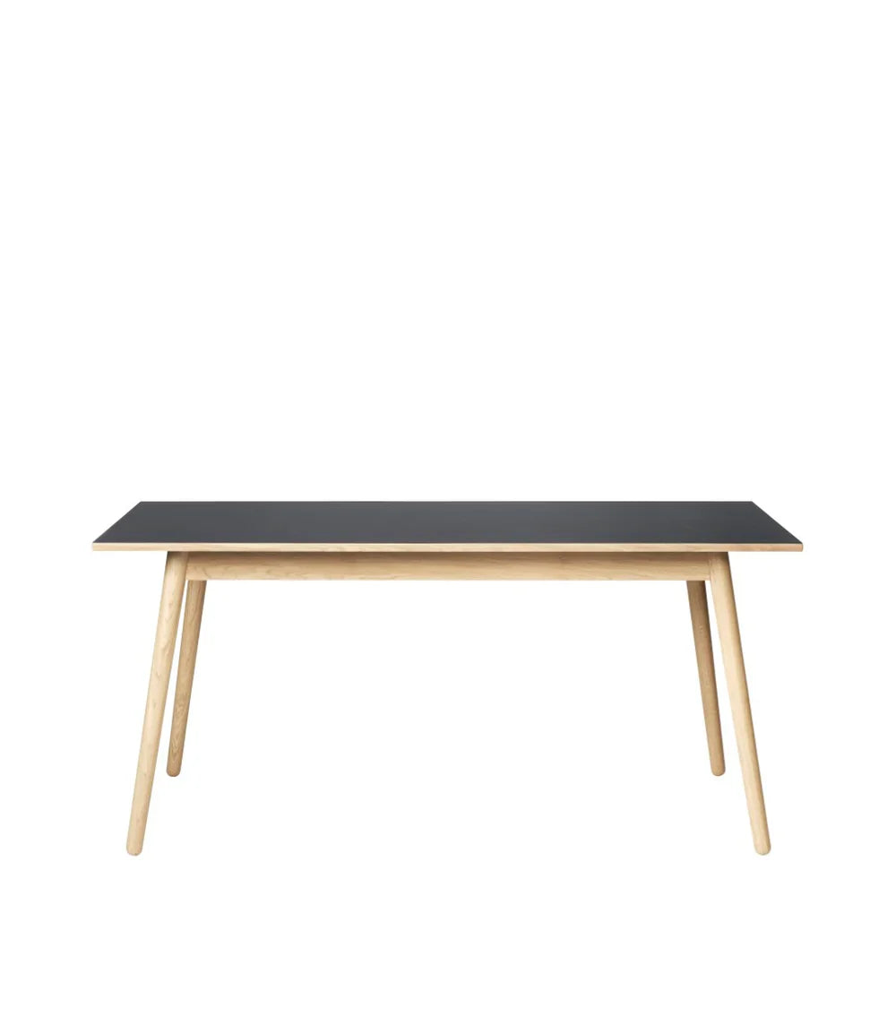 FDB Møbler Dining table in solid oak (dark grey), designed by Poul M. Volther