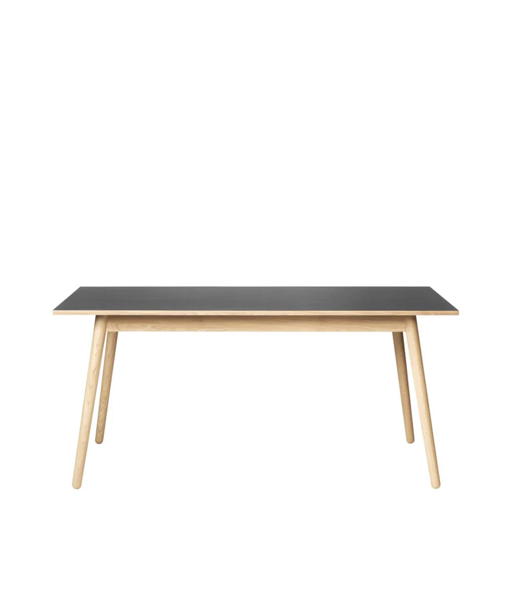 FDB Møbler Dining table in black-stained solid oak, designed by Poul M. Volther