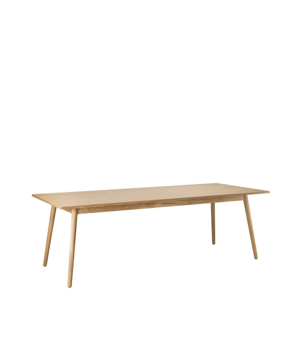 FDB Møbler Dining table in lacquered solid oak, designed by Poul M. Volther