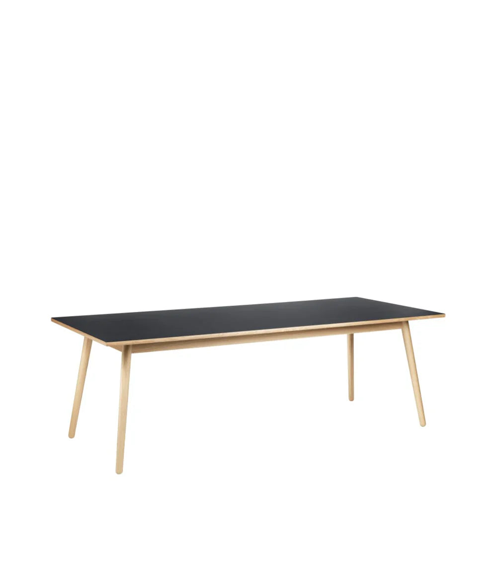 FDB Møbler Dining table in solid oak (black), designed by Poul M. Volther