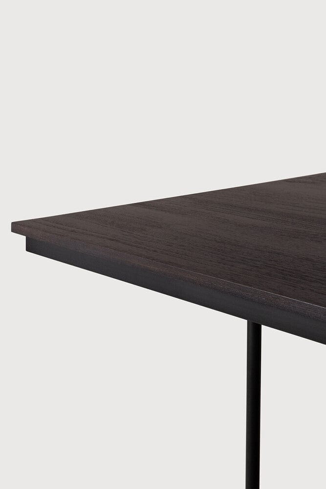 Detail of Ethnicraft Tacet Dining Table showing the brushed dark brown teak top edge