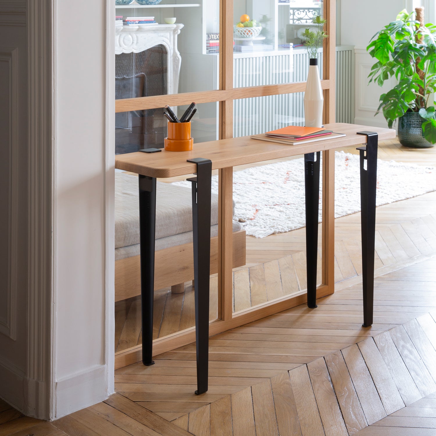 Tiptoe Dining Table with Eco-Certified Wood Top lifestyle photograph