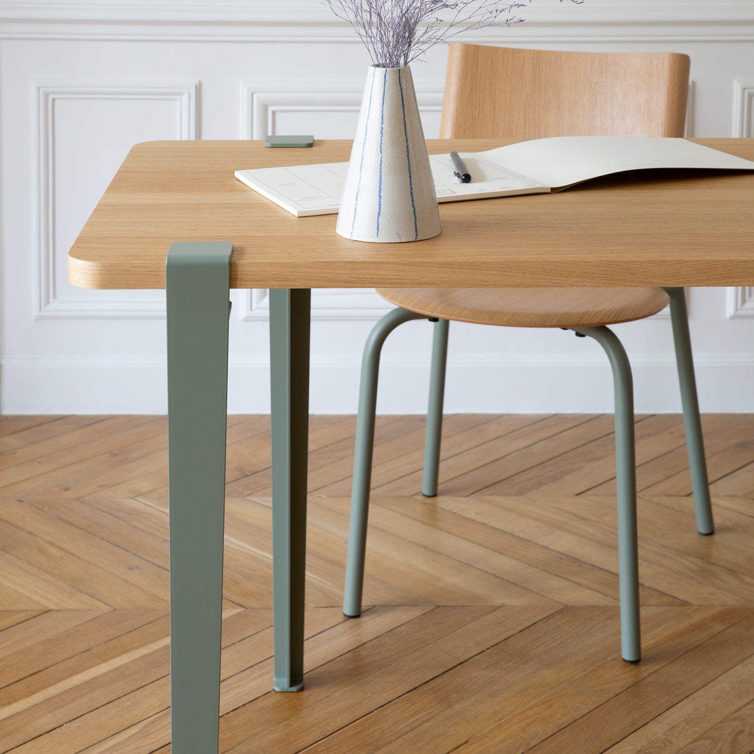 Tiptoe Dining Table with Eco-Certified Wood Top lifestyle photograph