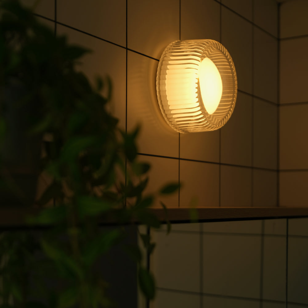 Firth Wall Light in White, shown in a bathroom setting, alternate view