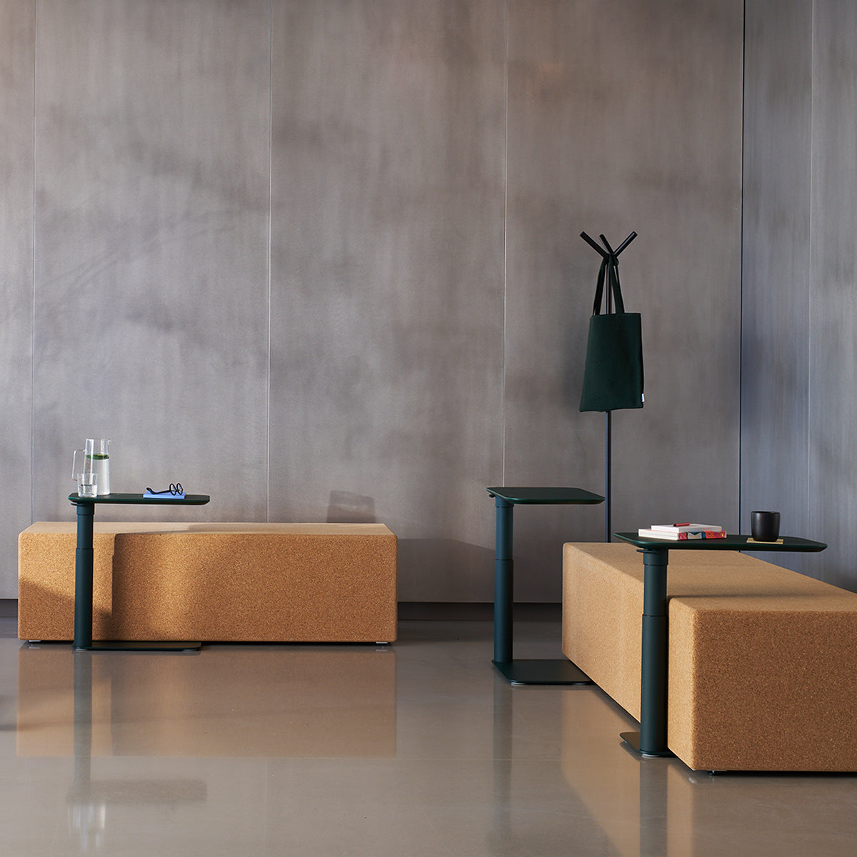 Humanscale Float Micro standing desk styled in a workspace, B Corp climate-positive office design