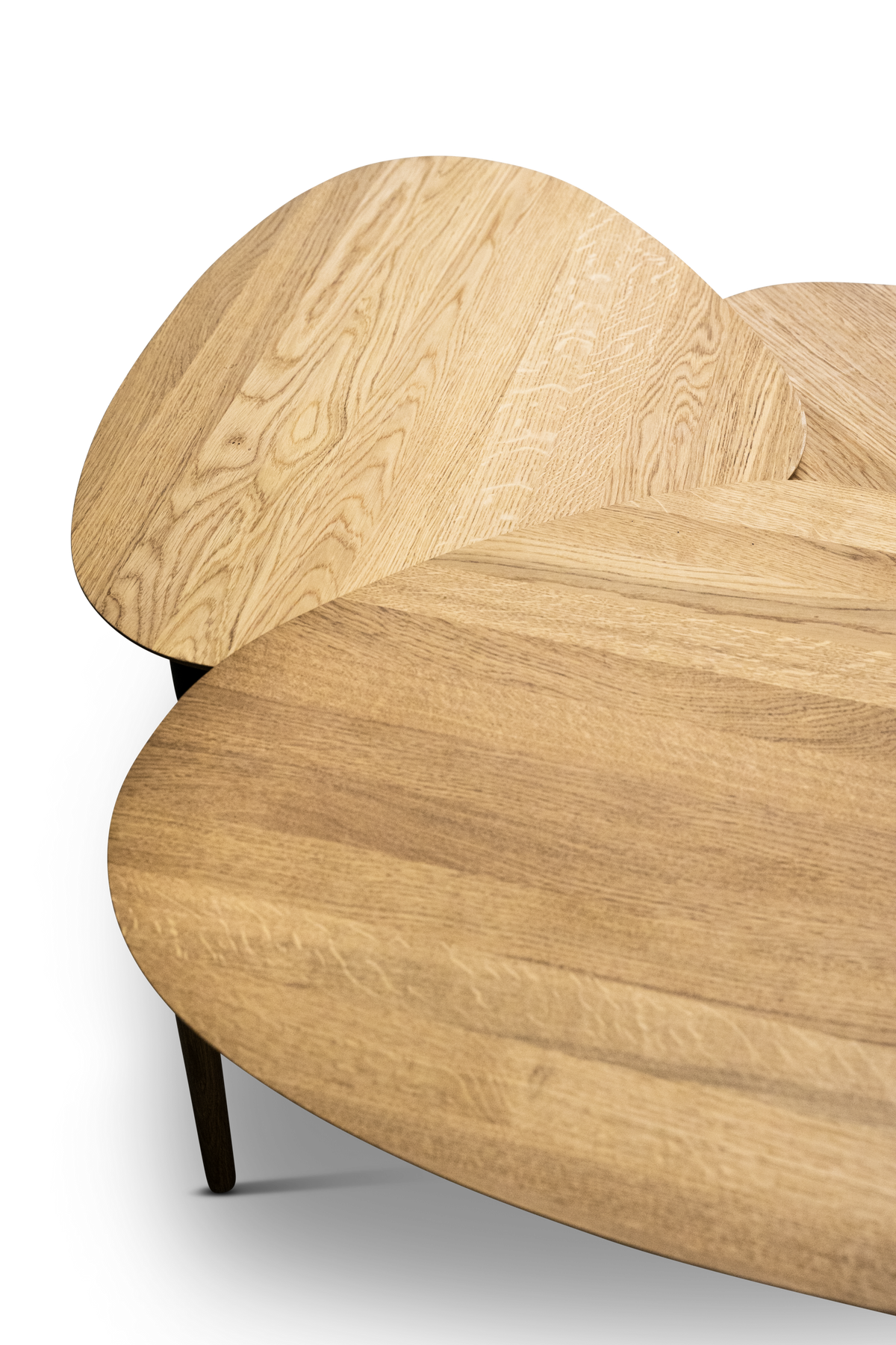 Detail of Bent Hansen Forma Nesting Tables (Set of 3) showing the shell-shaped tops