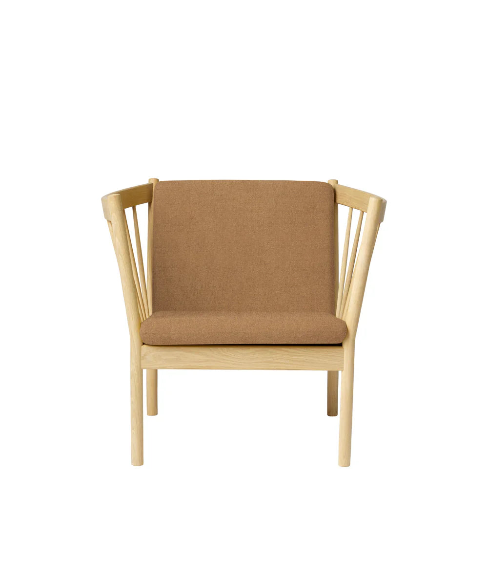 FDB Møbler Armchair in solid oak (brown), designed by Ole Jørgensen