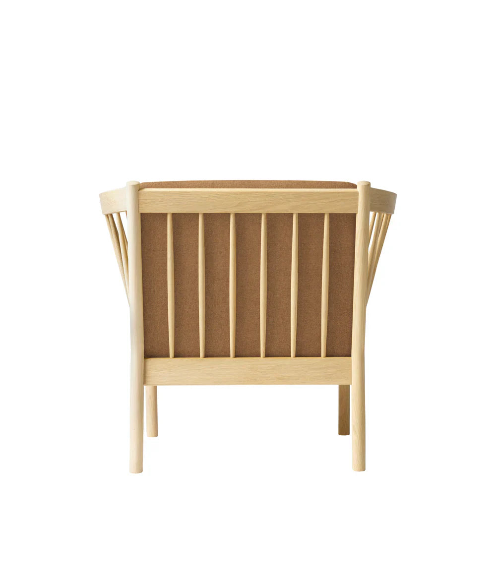 FDB Møbler Armchair in solid oak (brown), designed by Ole Jørgensen