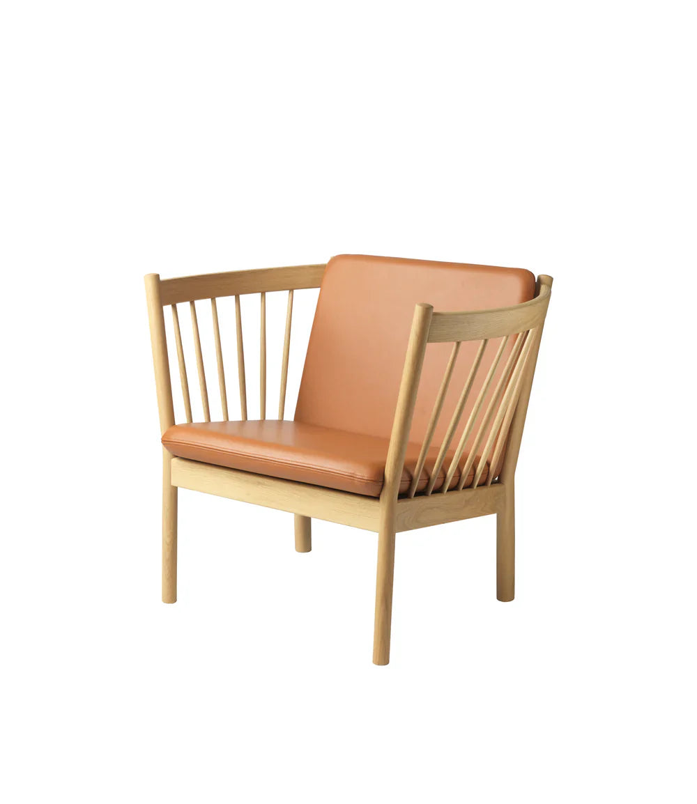 FDB Møbler Armchair in solid oak (cognac), designed by Ole Jørgensen