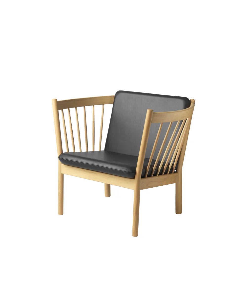 FDB Møbler Armchair in black-stained solid oak, designed by Ole Jørgensen