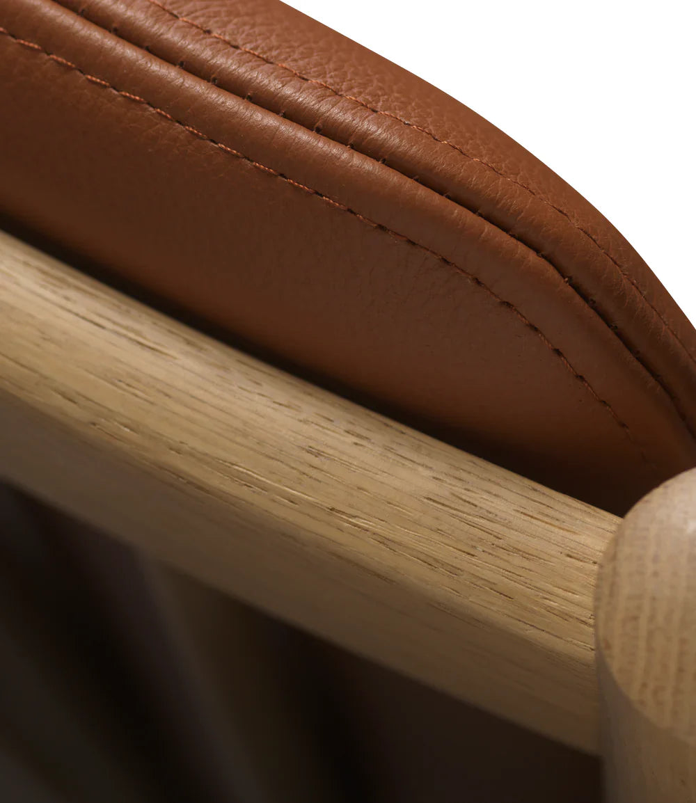 FDB Møbler Armchair in solid oak (cognac), designed by Ole Jørgensen