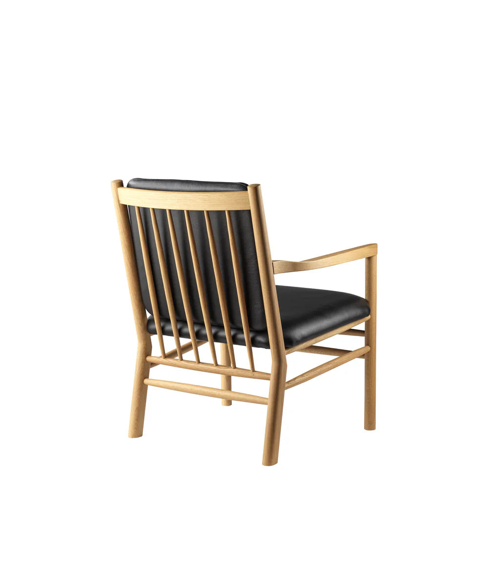 FDB Møbler Armchair in black-stained solid oak, designed by Ole Jørgensen
