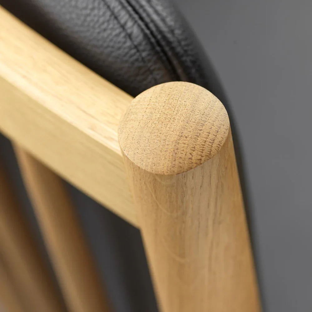 FDB Møbler Armchair in black-stained solid oak, designed by Ole Jørgensen