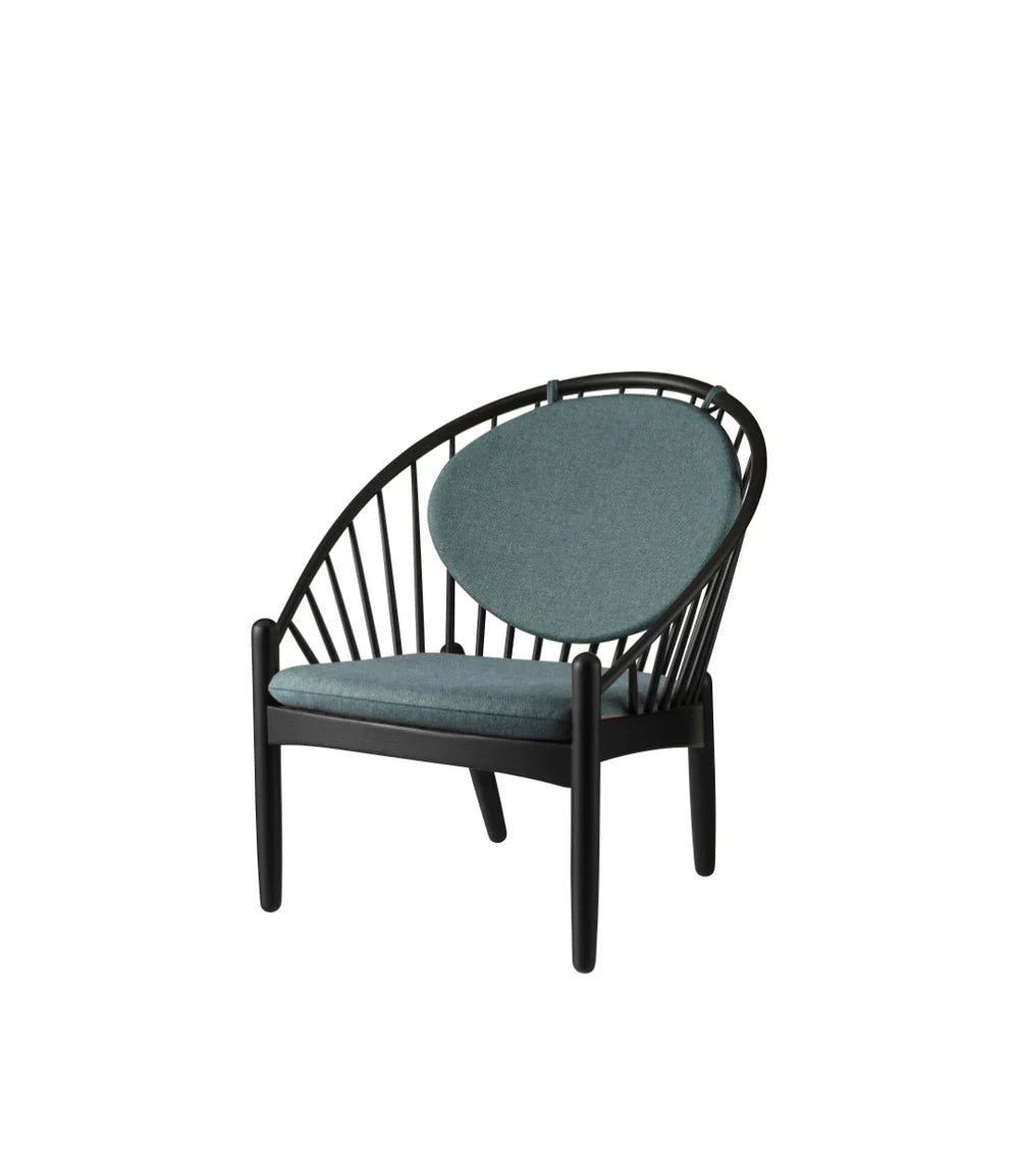 FDB Møbler Jørna Chair in jet black (green), designed by Poul M. Volther