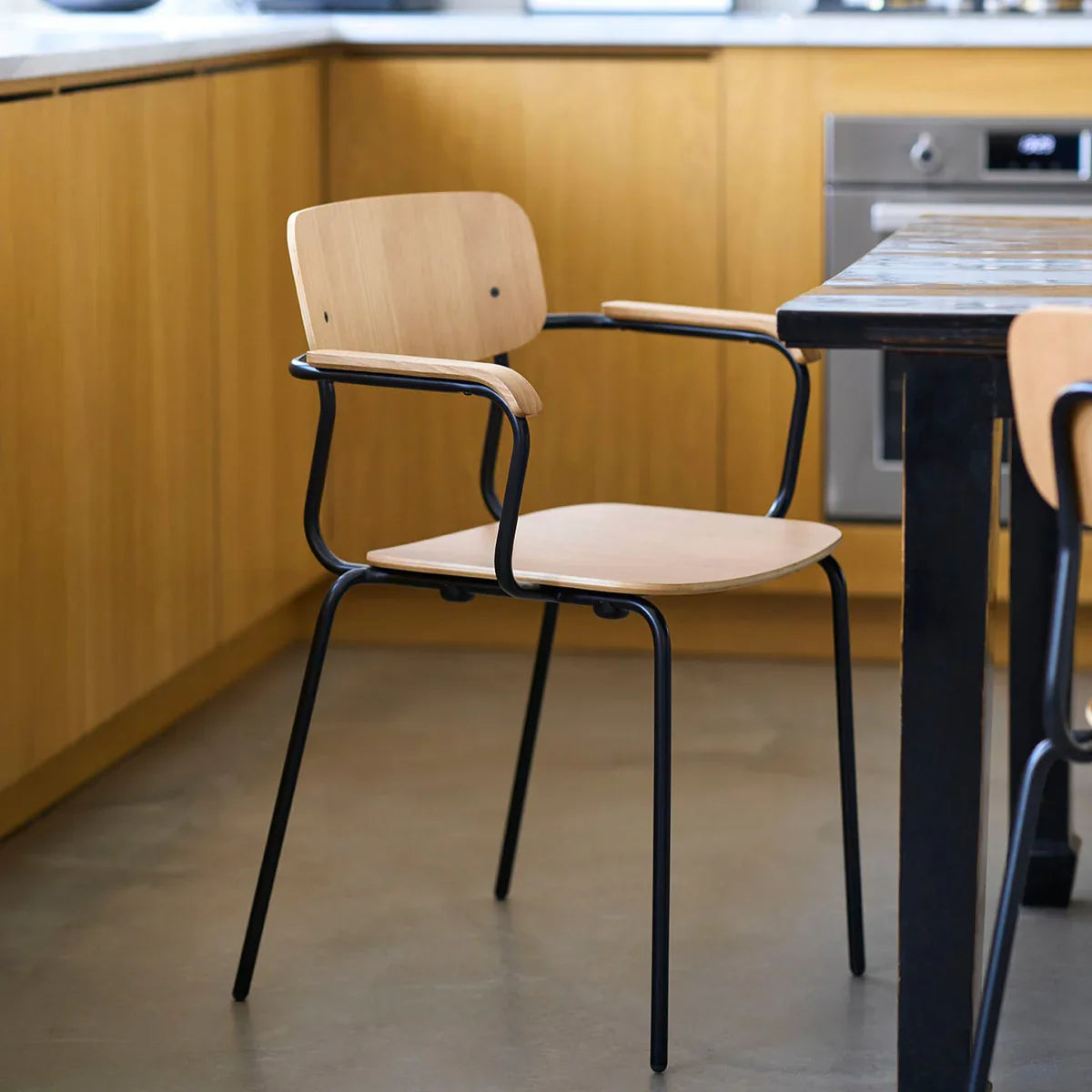 FDB Møbler Holmen Stackable chair w armrests in solid oak, designed by Jakob Thau