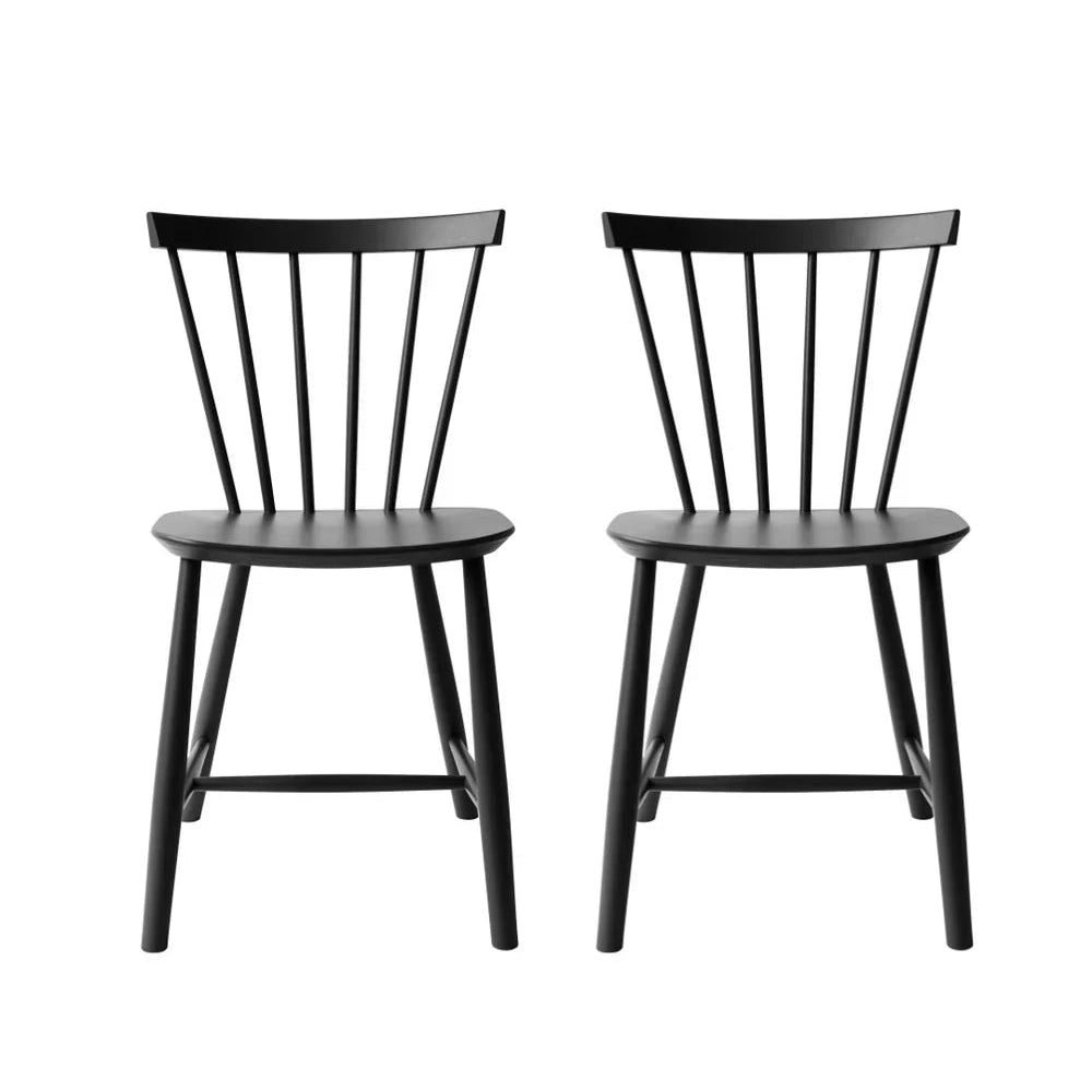 FDB Møbler Chair in jet black solid beech, designed in 1955 by Poul M. Volther, a Danish mid-century cooperative design