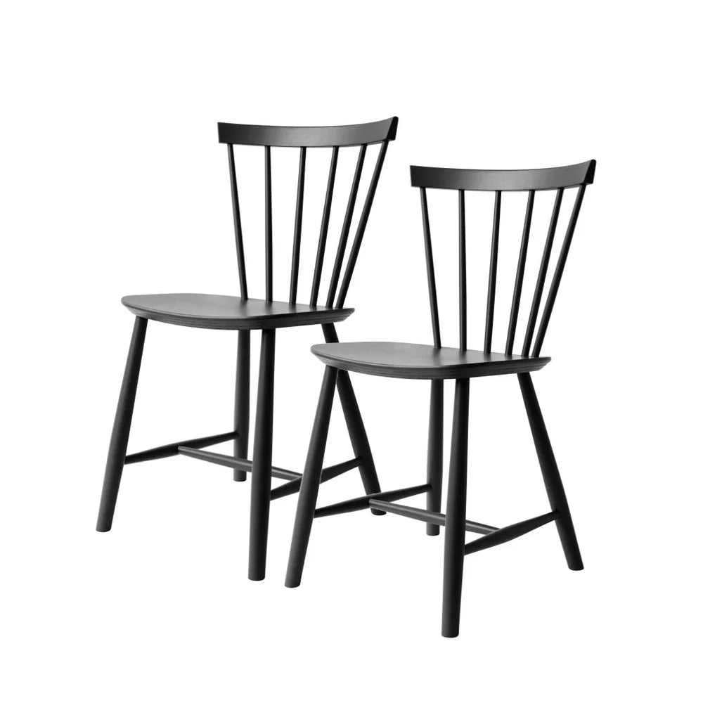 FDB Møbler Chair in jet black solid beech, designed in 1955 by Poul M. Volther, a Danish mid-century cooperative design