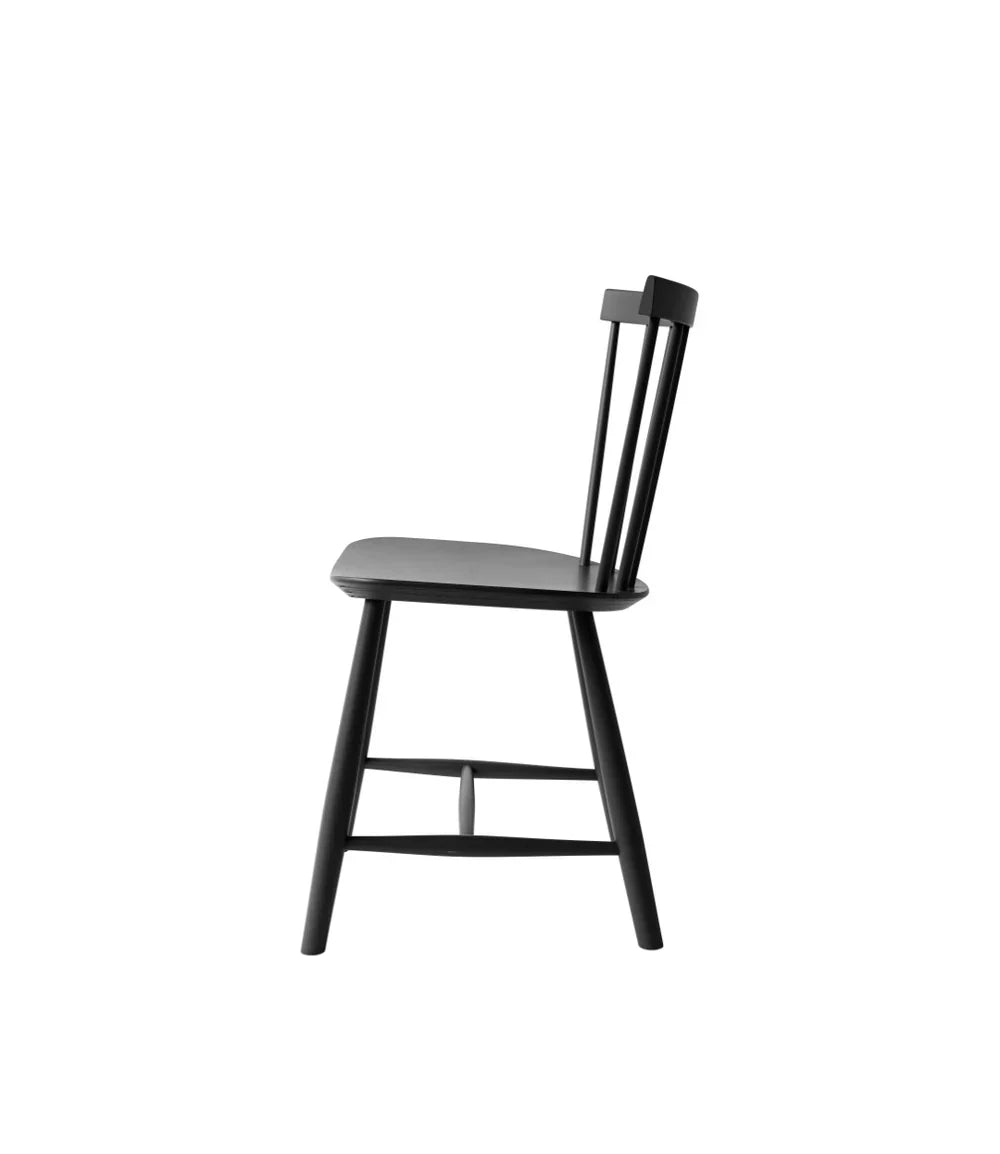 FDB Møbler Chair in jet black solid beech, designed in 1955 by Poul M. Volther, a Danish mid-century cooperative design