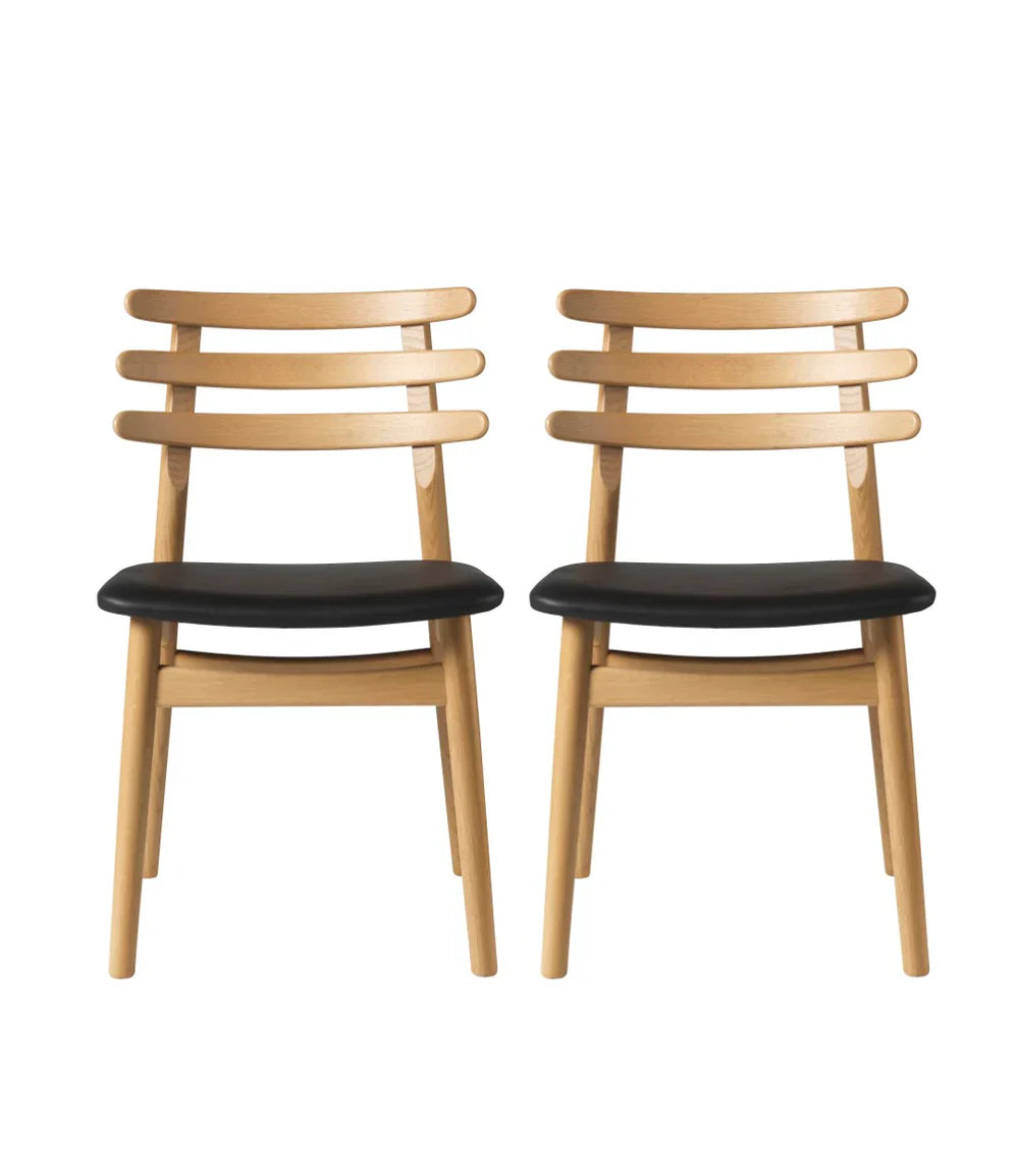FDB Møbler Chair Set of 2 in black-stained solid oak, designed by Poul M. Volther