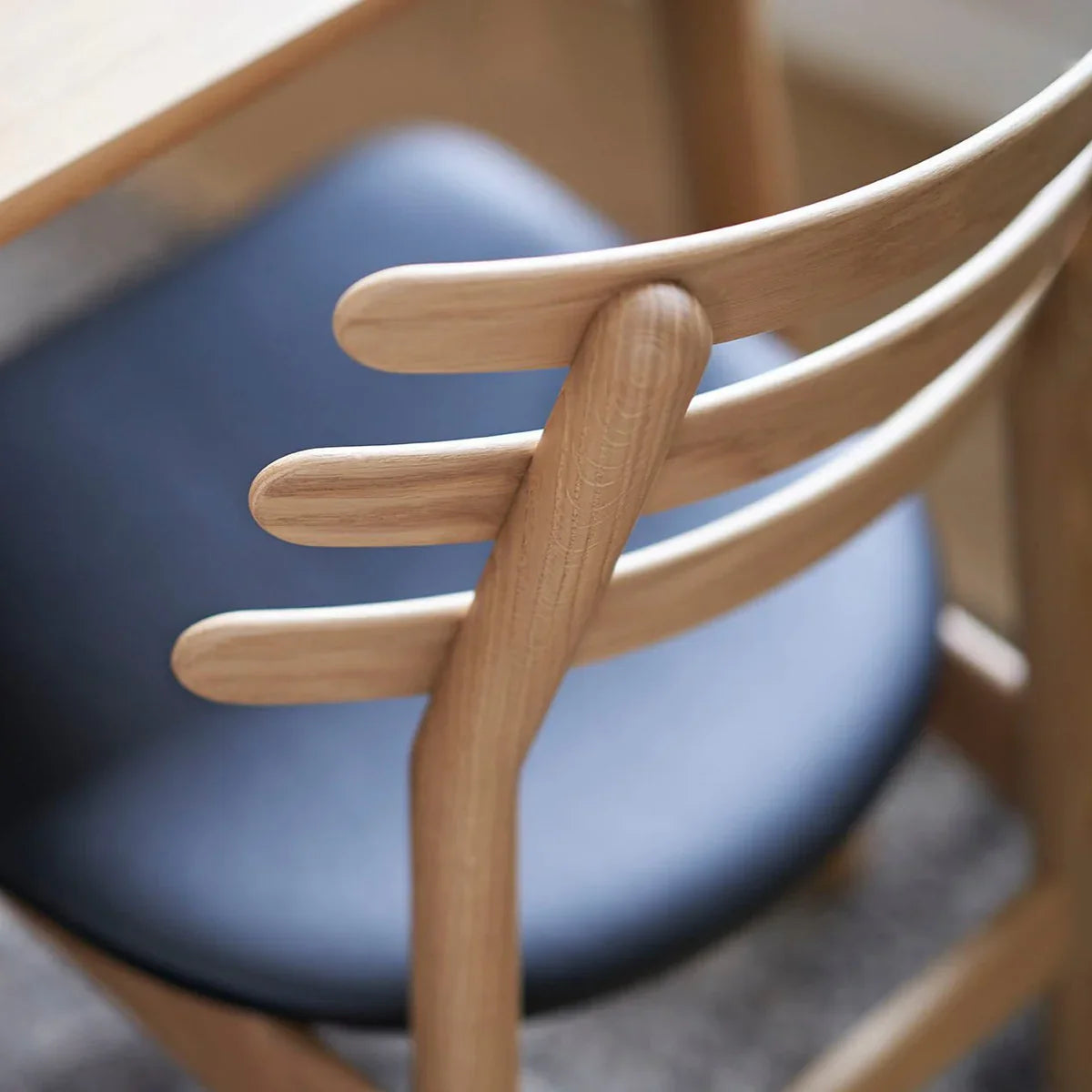 FDB Møbler - Chair in black-stained solid oak (black leather black), designed by Poul M. Volther
