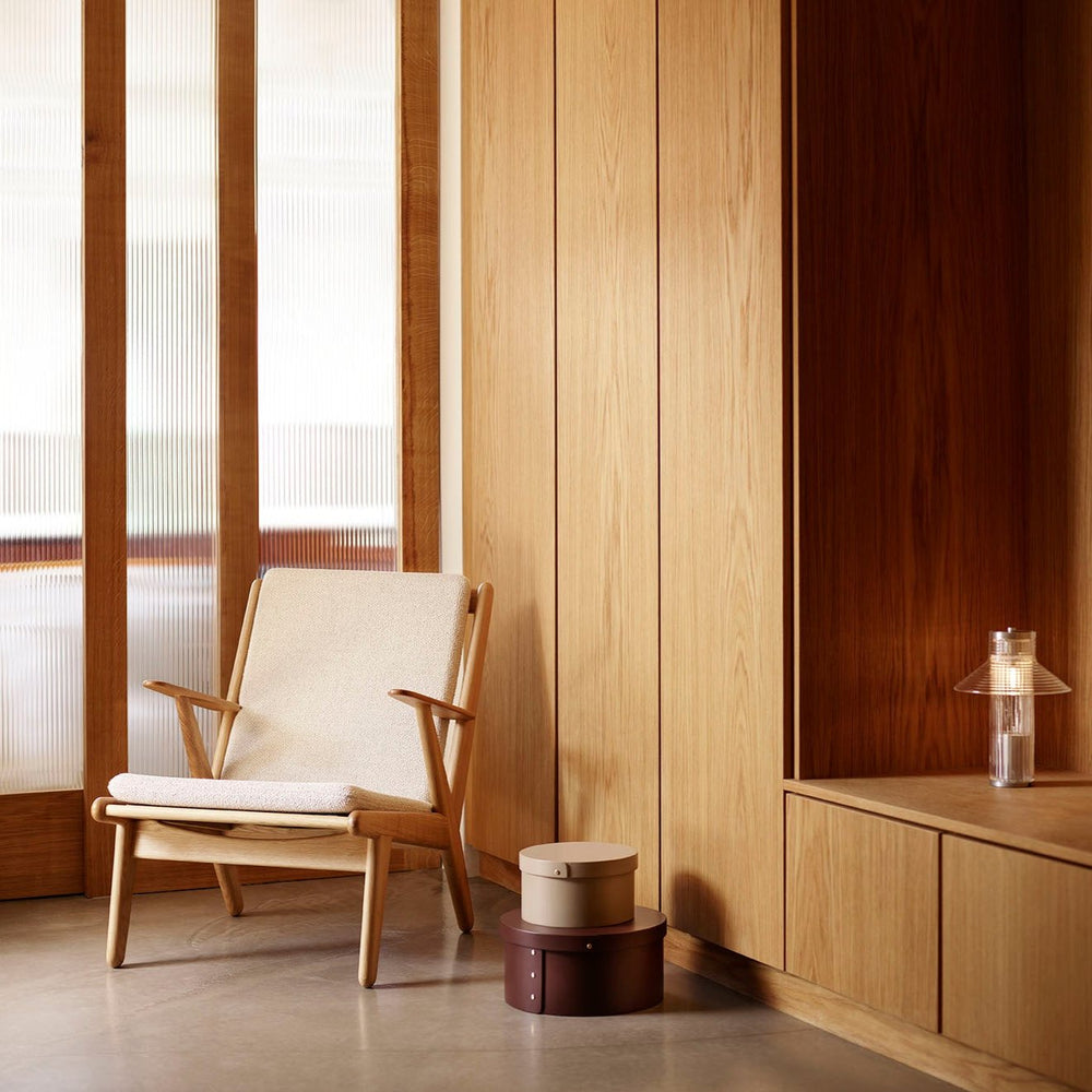 FDB Møbler Armchair in solid oak (beige), designed by Poul M. Volther