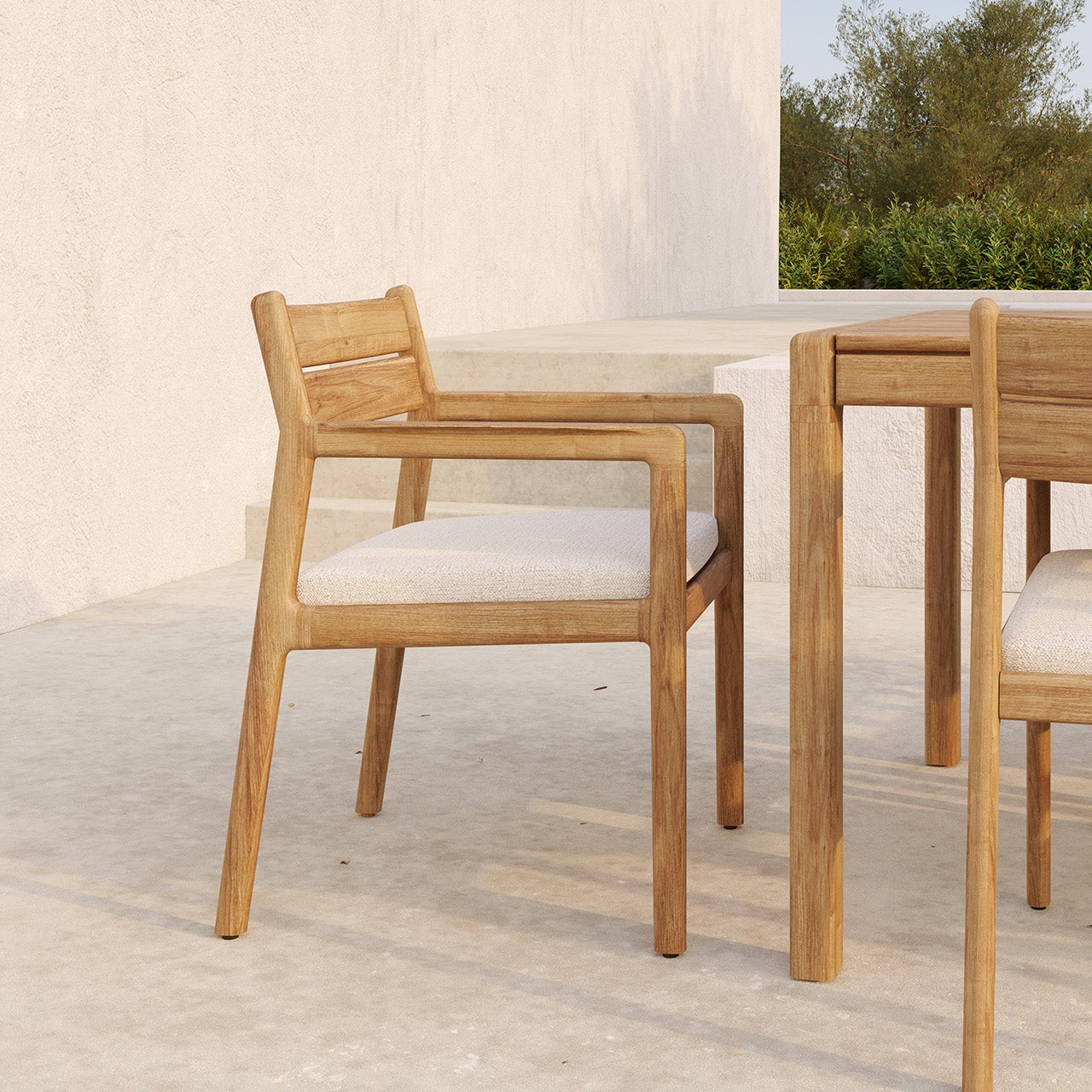 Ethnicraft Jack Outdoor Dining Chair styled in a dining room