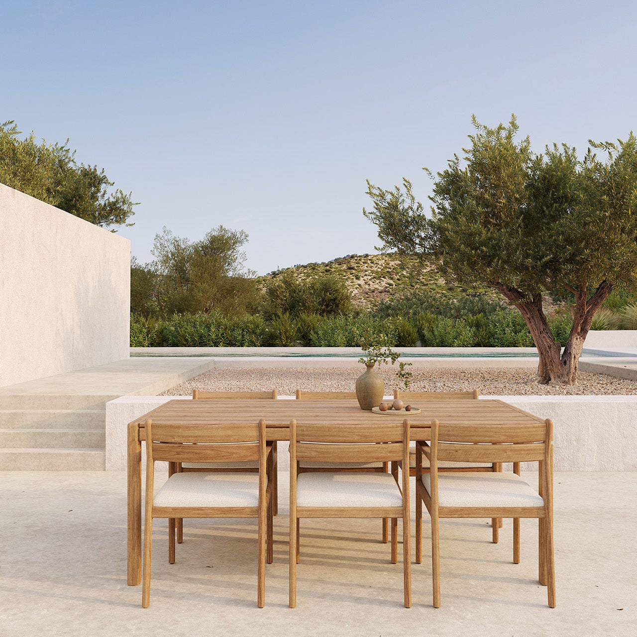Ethnicraft Jack Outdoor Dining Chair styled in a dining room