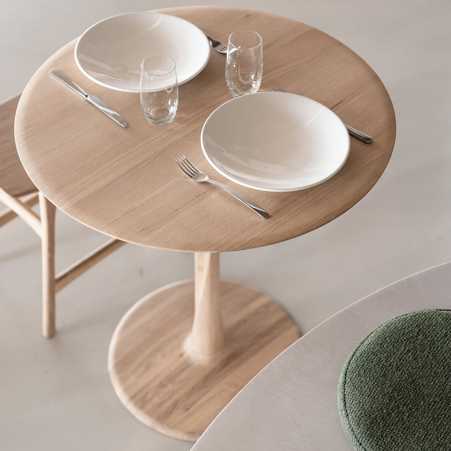 Ethnicraft Torsion Lounge Table styled in a dining room