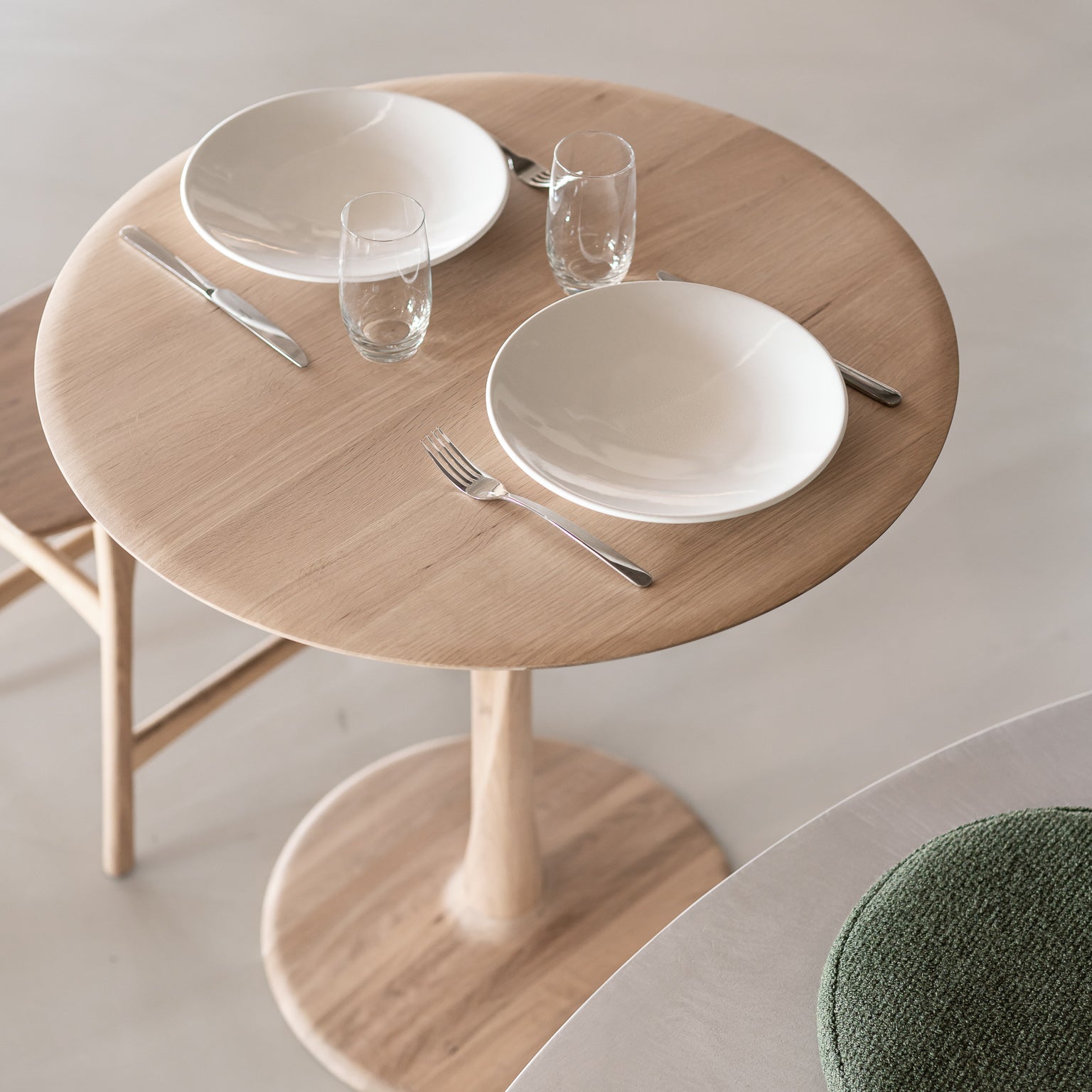 Ethnicraft Torsion Square Dining Table styled in a dining room