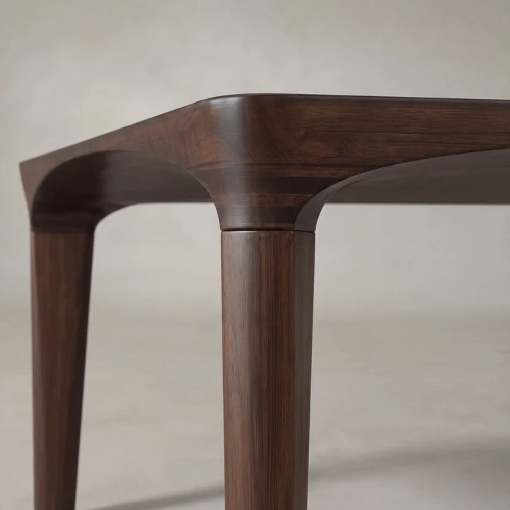 Detail of the Greenington Marseilles dining table leg joint in Black Walnut bamboo